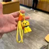Llavero grande de perro sentado nuevo colgante de bolsa lindo llavero de coche juguete de peluche regalo venta al por mayor