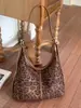Popular Bolso de Gamuza con Estampado de Leopardo para Mujer 2026 Nuevo Gran Capacidad para Viajes Diarios Moda Versátil Bolso Tote de Gran Capacidad