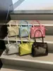 2026 Nova Bolsa de Ombro Único com Laço Estilo Coreano de Nicho Bolsa de Mão de Alta Qualidade para o Dia a Dia Bolsa Tote Simples Versátil Feminina