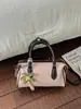 Bolso de mano de moda otoño e invierno, bolso tote pequeño, bolso de mujer, nuevo modelo 2025, bolso tipo almohada de color liso simple, bolso cruzado texturizado