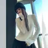 Suéter corto de punto casual para mujer con capucha, dobladillo curvo irregular, otoño e invierno 2025