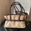 Bolso tote de lujo ligero de alta gama, nicho, para mujer, nuevo otoño 2026, vintage, versátil, de gran capacidad, bandolera