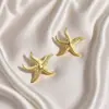 @Procesando Artículos: Pendientes de Estrella de Mar de Verano Europeos y Americanos, Pendientes Retro de Personalidad con Pliegues Irregulares de Moda, Venta al por Mayor
