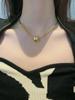 Collar con colgante de bola dorada de acero de titanio y hueso de serpiente para mujer, estilo frío, diseño de nicho simple, cadena de suéter con clavícula de moda.
