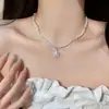 Collar de perlas de doble capa estilo retro francés para mujer, ligero, lujoso, de alta gama, con cadena para el cuello.