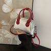 2024 Primavera y Verano Nueva Moda Color Contraste Portátil Bolso Pequeño Tipo Concha Bowling para Mujer Bandolera de un Hombro Lujo Ligero Bolso Popular