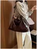 Bolso grande de alta gama vintage para mujer 2026 nuevo bolso de hombro de moda para el trabajo bolso de mano para otoño e invierno bolso tote