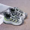 Zapatillas infantiles 2026 otoño nuevo estilo botón giratorio para niños zapatos de exterior tipo papá zapatillas de correr zapatillas casuales para niñas