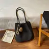 Bolsa Tote com Padrão Trançado Feminina 2026 Nova Outono Inverno Retrô Meilade Bolsa para o Dia a Dia Grande Capacidade Ombro Único Bolsa de Axila