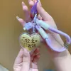 Oro 999 Dibujos Animados Corazón Princesa Por Favor Hazte Rico Lindo Bolso para Teléfono Llavero Colgante Regalo de Promoción Al por Mayor
