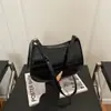 Bolsa de Ombro Texturizada Estilo Retrô para o Trabalho Feminina Nova Moda Inverno 2025 Bolsa de Braço Estilo Coreano Casual Personalizada Bolsa Feminina