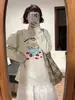 Camiseta de Algodón Puro Estilo Retro Americano Hombro Normal Manga Larga para Mujer 2026 Nuevo Diseño con Sentido de Marca de Nicho Tendencia Otoñal Top Holgado