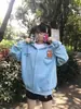 Sudadera con capucha y cierre de velcro bordada con gatito americano para mujer 2025 Nueva Otoño e Invierno Holgada Perezosa Sudadera con Capucha Chaqueta Moderna