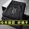 Venta directa de fábrica pantalones casuales para hombre invierno más terciopelo gruesos de pana pantalones de pana para hombre mediana edad sueltos pierna recta pantalones de pana