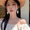Aretes de Borla de Perla y Pétalo Blanco de Hada Súper Femeninos de Lujo Ligero Nicho Alta Moda Pendientes de Flor Exagerados