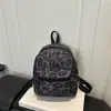 Otoño 2026 Nuevo Elegante Gama Alta Retro Dulce Fresco Chica Picante Estampado de Leopardo Moderno Sencillo Versátil Mochila