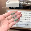 Atacado de fábrica brincos de trevo de quatro folhas em prata de lei s925 com incrustação de material perigoso jade verde Yang pequenos frescos de verão requintados para mulheres