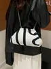 Bolso de Diseño de Nicho Transfronterizo 2026 Nuevo Bolso de Cadena Bolso de Hombro de Moda Rayado Bolso Cruzado de Gran Capacidad para Mujer