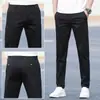 Pantalones casuales de verano nuevos, pantalones para hombre estilo K, pantalones modernos holgados de pierna recta para jóvenes, de algodón puro elástico color blanco hueso para hombre
