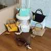 Nuevo bolso de mano pequeño transfronterizo 2026 para mujer, bolso de trabajo con un toque de alta gama, bolso versátil de hombro y cruzado, bolso tipo bollo
