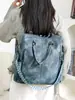 Mochila de mujer modelo nuevo 2026 transfronteriza, gran capacidad, estampado de mezclilla, moderna y versátil, se puede usar como bolso de hombro, bolso de mano, bolso cruzado para viajes y desplazamientos