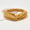 Nueva banda elástica cruzada para el cabello banda para lavar el cabello accesorios para el cabello de color liso para mujer banda elástica coreana para el cabello de yoga deportivo al por mayor