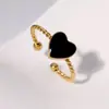 Moda Europea y Americana Tendencia Anillo Abierto Esmalte Negro Estilo Retro Francés Anillo Redondo de Corazón Venta al por Mayor