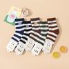 Calcetines de felpa para niños de otoño e invierno de Yan Feilin, calcetines gruesos de dibujos animados de moda, fabricantes al por mayor