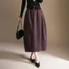 Falda de botón elegante de longitud media que cubre las caderas, reduce la edad, estiliza, falda separada, moda de otoño 2026, falda de linterna moderna y de moda