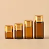 Fabricante en stock 1-5ml botella pequeña de muestra de prueba líquido transparente marrón botella secundaria botella de esencia botella pequeña de aceite esencial