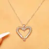 Collar y anillo únicos de estilo europeo y americano con forma de ciempiés y corazón, colgante de corazón hueco de nicho, anillo abierto para el dedo índice con ciempiés entrelazado.