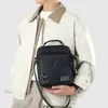 Bolsa Nueva para Hombre Otoño/Invierno 2026 Bolso de Hombro Único Bolso Cruzado de Gran Capacidad Impermeable de Tela Oxford Bolso Cruzado Conveniente para Viajes al Aire Libre