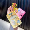 Chaveiro de brinquedo de mármore magnético, pingente de console de jogo de máquina de pegar bonecas, chaveiro pequeno para alívio de estresse de estudante atacado