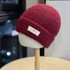 Chapéu de Lã Estilo Coreano Ins com Rosto Sorridente para Mulheres Outono e Inverno Novo Aquececido Chapéu Baotou Mostrando o Rosto Proteção Auricular Pequena Chapéu de Tricô