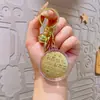 520 Dia dos Namorados Chaveiro Redondo para Bolo com Folha de Ouro Pingente Criativo de Presente de Aniversário Paz e Alegria Decoração de Mochila Atacado