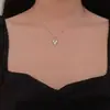 Collar con colgante de corazón geométrico vintage desgastado, cadena corta para clavícula de estilo minimalista hip-hop para mujer, joyería transfronteriza europea y americana