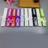 Comercio electrónico transfronterizo abanico femenino elegante más vendido 21cm abanico de boda abanico femenino caja hueca 14 colores opcionales