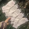 Calcetines Deportivos Blancos Cortos para Mujer Primavera y Verano Long Yixiang Calcetines Tobilleros Lindos Estilo Universitario Nuevo Modelo para Hombre 2025