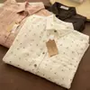 Camisa de Algodão Estilo Japonês Artístico Floral Pastoral Nova para Primavera e Deslocamento Manga Longa Solta Macia Feminina