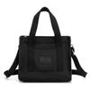 Bolso de hombro informal para mujer, bandolera sencilla y de color puro, bolso de nailon ligero, impermeable y versátil. Venta al por mayor.