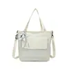 Bolso tote de nylon con estampado de estrellas estilo coreano, nuevo, transfronterizo, gran capacidad, bolso de hombro, bolso de mano, adecuado para ir al trabajo, versátil y casual para mujeres