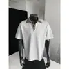 Comercio exterior al por mayor transfronterizo 2026 Verano Falso Dos Piezas Manga Corta para Hombre Verano de Moda Marca Ambiente de Alta Gama Guapo Travieso Holgado Media Manga