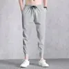Pantalones jogger finos de verano para hombre, estilo coreano, corte holgado, pantalones de seda helada, pantalones largos casuales