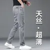 Jeans ligeros de seda helada color gris ahumado para hombre de verano, corte slim recto, elásticos, versátiles, pantalones casuales de Tencel