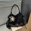 Bolsa tote de bolinhas estilo girlie transfronteiriça para mulheres, novo modelo outono 2026, grande capacidade, adequada para ir ao trabalho, bolsa de mão e bolsa de ombro