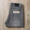 Estação europeia verão ultra-fino respirável algodão modal lavado micro elástico masculino pequeno reto corte slim calça jeans cinza fumê