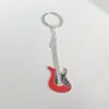 Chaveiro de Metal para Guitarra de Novo Produto Transfronteiriço Pintura Personalizada Pingente Criativo com Gotejamento de Tinta Acessórios Chaveiro Personalizado Criativo