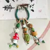 Abalorios para Bolsos Jingdezhen al por Mayor Llavero de Cerámica Hecho a Mano Fresa Artístico Fresco y Delicado Lindos Abalorios para Bolsos
