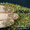 Punto de Venta Caliente al por Mayor Fondo Puntiagudo Diamantes de Imitación Cristal Suelto Micro Taladro de Vidrio Arte de Uñas Arena de Cristal DIY Decoración de Uñas Taladro