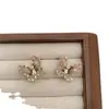 Clip de Oreja de Mariposa de Circonita Colorida Nicho Sentido de Alta Gama Pendiente Pequeño y Pequeño Pendientes Nuevo Único Simple Elegante Pendientes